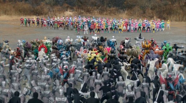 This is from the end of the film, but if you really think it's a spoiler that the Riders and Sentai eventually team up...